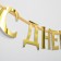 Garland on the tape, metallic "with DR" gold, length 140 cm