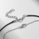Kulons "Uzolnutini" on the magnet, halves of the heart, black-silver color, 48 cm