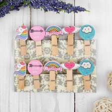 Decorative clothespins with a rope for the suspension 