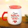 New Year. A mug with a lid and a spoon “New Year will warm”, 450 ml