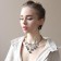 Earrings Metal "Botthega" two ovals, black color