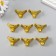 Corner (leg) for the casket plastic "reptile" gold set 8 pcs C003 2x1.8 cm