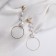 Earrings with pearls "tenderness" of thread, white color in gold