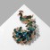 Brooch "Bird" Peacock, colored in yellow gold