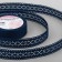 The tape is decorative, repression "openwork flowers", 25 mm × 9.1 ± 0.5 m, dark blue color