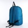 A backpack with a zipper, external pocket, dark blue color