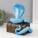 New Year's piggy bank "Cobra on the chest" 20 x 17 x 12 cm.