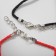 Bracelets "Demetrons" castle+key, black-red color, l = 18 cm