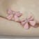 Earrings Metal "Bows" tape, pink color