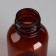 A bottle for storage, with a pipette, 35 ml, brown/white color