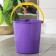 A bucket with a measured scale, 10 l, color mix