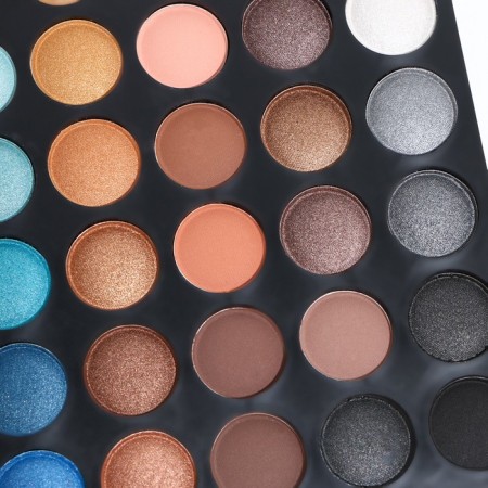 A set of decorative cosmetics (shadows for the eyelids, blush, lip gloss, correctors)-7