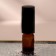 Vocal bottle for perfume, with a spray, 5 ml, brown/black color