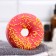 The bath bomb "Donut with coconut sprinkling", red