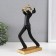 Souvenir Polystone "soloist" black with gold 14x8x27 cm
