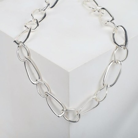 The necklace "chain" is different links, color silver, 55 cm
