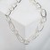 The necklace "chain" is different links, color silver, 55 cm