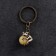 Souvenir-codes "Frog with a ball", brass, amber