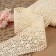 Knitted lace, 70 mm × 10 ± 1 m, beige color