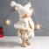 Interior doll "Baby in a coat and a hat with an asterisk" 24x14x43 cm